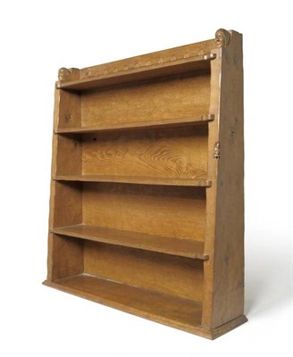 Lot 1264 - A Thomas  "Gnomeman " Whittaker Oak Bookcase, the raised back over four waterfall shelves, the...