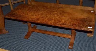 Lot 1265 - A Bob  "Wrenman " Hunter Burr Oak 4' Refectory Coffee Table, on two carved octagonal legs joined by