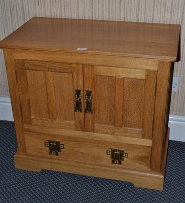 Lot 1275 - An English Hardwood Furniture Fumed English Oak Television Cabinet, by Nigel Dixon, the two...