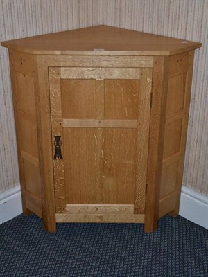 Lot 1276 - An English Hardwood Furniture Fumed English Oak Panelled Floor Corner Cupboard, by Nigel Dixon,...