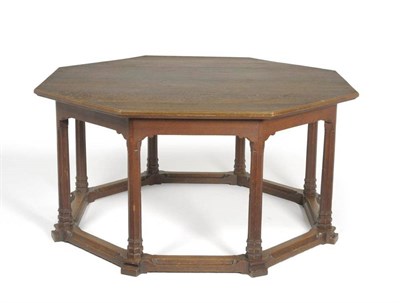 Lot 1279 - Attributed to Sir Robert Lorimer  An Arts & Crafts Oak 5' Table, the plain octagonal planked...