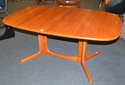 Lot 1295 - A Danish Teak Extending Dining Table, designed by No Moller and made by Gudme, on two supports...