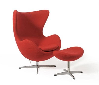 Lot 1301 - A Modern  "Egg " Lounge Chair, after a design by Arne Jacobsen, red weave fabric upholstery,...