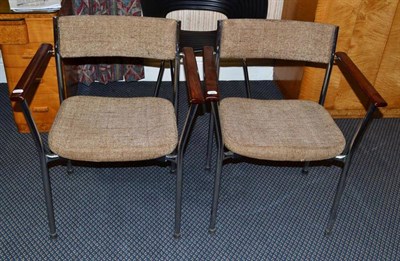 Lot 1311 - A Set of Six 1960's/70's Office Elbow Chairs, with rosewood arms, upholstered seats and backs, on a