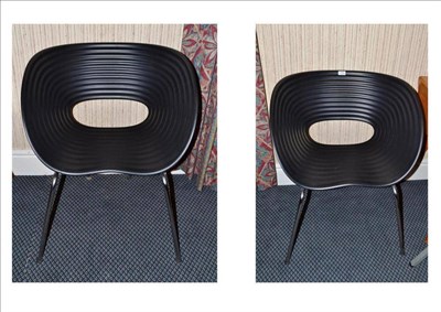 Lot 1313 - A Set of Four Vitra Tom Vac Chairs, designed by Rod Arad, circa 2000, black plastic seats, on...