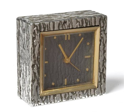 Lot 1321 - A Silver Travelling Alarm Clock, signed Boucheron, Paris, circa 1930, bark finished case with front