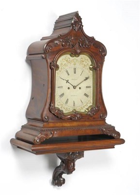 Lot 1355 - A Mahogany Striking Bracket Clock, circa 1830, arched case with applied floral and scroll...