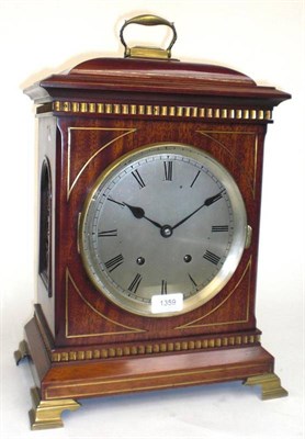 Lot 1359 - A Mahogany and Brass Inlaid Quarter Striking Table Clock, circa 1890, the caddy top with...