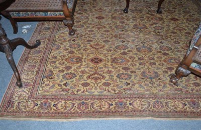 Lot 1383 - Anatolian Carpet Probably Pandirmar The cream field with an allover design of floral vines enclosed