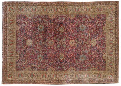 Lot 1389 - Fine Signed Hereke Carpet North East Anatolia The raspberry field richly decorated with an...