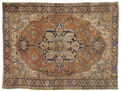 Lot 1394 - Heriz Carpet Persian Azerbaijan The rust field of angular vines around a cruciform medallion framed