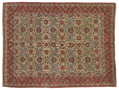 Lot 1397 - Good Ghom Carpet Central Persia The allover ivory lattice field of palmettes and vines enclosed...