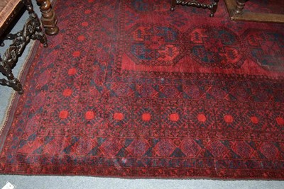 Lot 1402 - Afghan Carpet Afghan Turkestan The madder field with columns of typical  "elephant foot "...