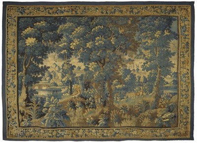 Lot 1405 - A Late 17th/Early 18th Century Flemish  "Verdure " Tapestry  Woven in silk and wool depicting a...