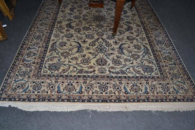 Lot 1409 - Isfahan Carpet Central Persia The ivory field of scrolling floral vines enclosed by similar borders