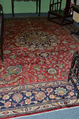 Lot 1410 - Tabriz Carpet Persian Azerbaijan The brick red field of flowering vines around an indigo pole...