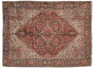 Lot 1426 - Heriz Carpet Perisan Azerbaijan The claret field of angular vines and stylised flowerheads around a