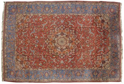 Lot 1429 - A Fine Large Isfahan Carpet The shaded terracotta field of scrolling vines and palmettes around...