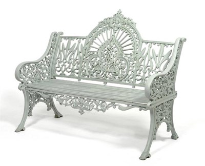 Lot 1435 - A Coalbrookdale Style Cast Iron Garden Bench, 20th century, the curved back cast and pierced...