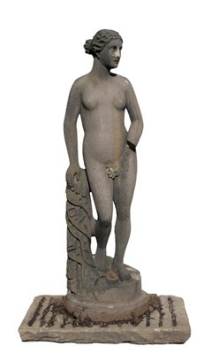 Lot 1441 - A 19th Century Carved Stone Sculpture of a Classical Nude Maiden, on circular base with carved tree