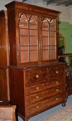 Lot 1473 - A George IV Mahogany Secretaire Bookcase, 2nd quarter 19th century, the ovolo moulding above...