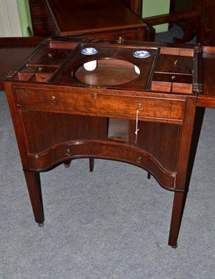 Lot 1478 - A George III Mahogany Washstand, circa 1800, with two hinged leaves enclosing a fitted interior...