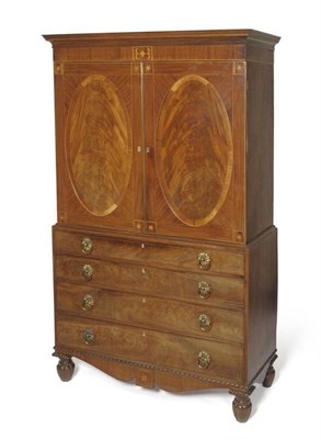 Lot 1483 - A George IV Mahogany, Tulipwood and Rosewood Crossbanded Linen Press, 2nd quarter 19th century, the