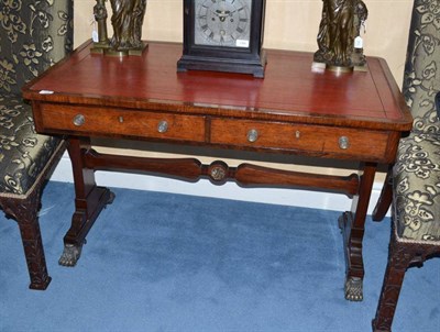 Lot 1485 - A Late Regency Rosewood Library Table, 2nd quarter 19th century, with red leather writing...