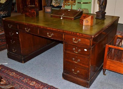 Lot 1499 - A George III Style Mahogany Partners' Desk, late 19th century, inset a green and gilt leather...