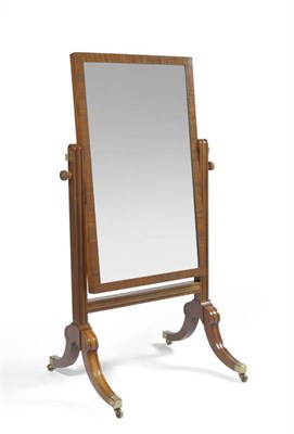 Lot 1508 - A Mahogany Cheval Mirror, circa 1820, the rectangular plate between standard supports with...