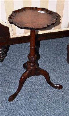 Lot 1517 - A George II Style Mahogany Tripod Table, of unusual size, the moulded top above a turned and...