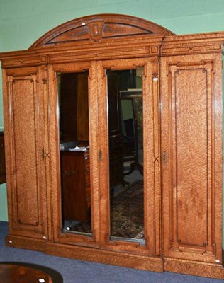 Lot 1524 - A Victorian Burr Maple and Ebony Strung Wardrobe, late 19th century, of breakfront form, with...