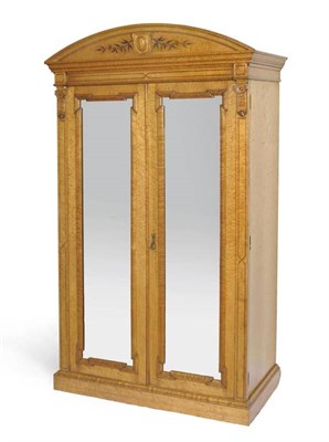 Lot 1525 - A Victorian Burr Maple Two Door Wardrobe, late 19th century, the domed cornice above mirror...