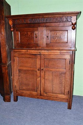 Lot 1568 - An 18th Century Joined Oak Cwpwrdd Deuddarn, with carved initials IAW? and dated 1715 above...