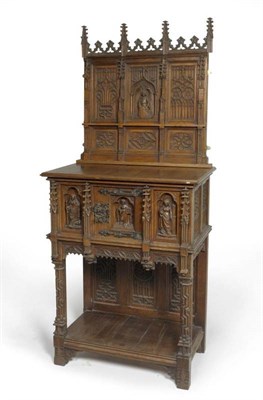 Lot 1573 - A 19th Century French Oak Gothic Revival Cabinet, carved with three religious figures and...