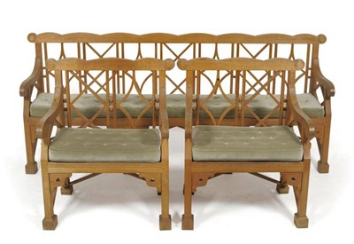 Lot 1579 - A J Brett & Co Ltd: An Oak Drummond Seat/Bench, in 18th century style, modern, with shaped top...