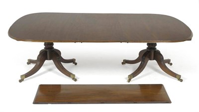 Lot 1610 - A Scottish Regency Mahogany Double Pedestal Dining Table, of rectangular rounded form, raised...