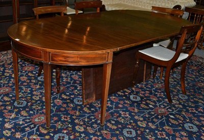 Lot 1612 - A George III Mahogany, Ebony and Boxwood Strung D Shape Dining Table, circa 1800, with plain...