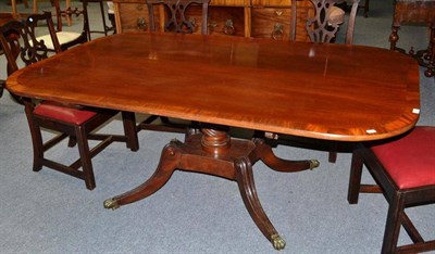 Lot 1614 - A Regency Mahogany and Crossbanded Dining Table, 2nd quarter 19th century, of broad rectangular...