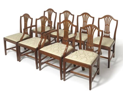 Lot 1621 - A Set of Eight Late George III Mahogany Dining Chairs, early 19th century, with curved top...