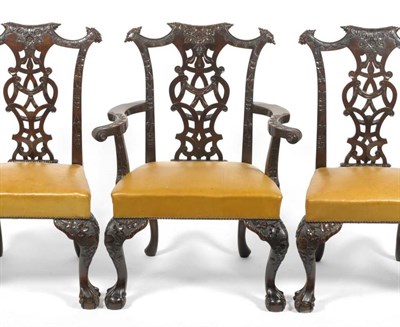 Lot 1624 - A Set of Twelve Chippendale Style Carved Mahogany Dining Chairs, early 20th century, upholstered in