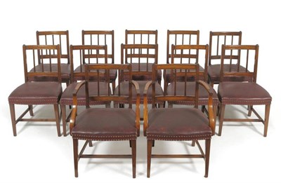 Lot 1625 - A Set of Twelve Late George III Mahogany Dining Chairs, early 19th century, the curved top rail and