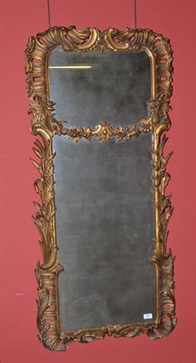 Lot 1657 - A Late 19th Century Gilt Pier Glass, the rococo and C scroll frame with stylised flowers, 136cm...