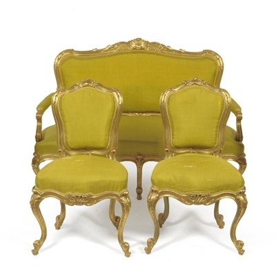 Lot 1690 - A Louis XV Style Carved Giltwood and Gesso Settee, late 19th century, the padded back support, arms