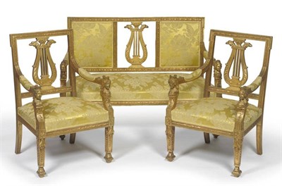 Lot 1693 - An Early 20th Century Carved Giltwood Neo-Classical Style Settee, upholstered in yellow floral silk