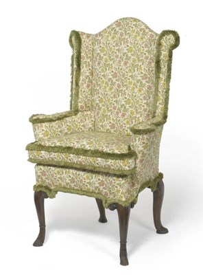 Lot 1695 - An Elegant Wingback Chair of Small Proportions, probably 18th century, recovered in floral...