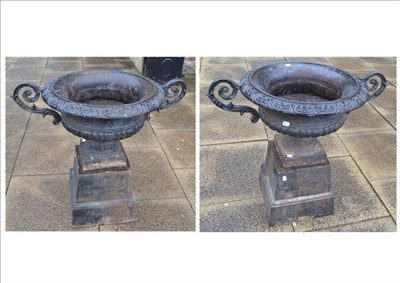 Lot 1442F - A Pair of Cast Metal Garden Urns, with gadrooned bodies, acanthus scroll handles, raised on...