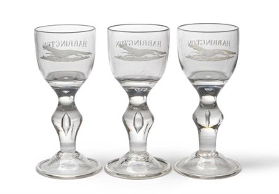 Lot 12 - A Set of Three Heavy Baluster Wine Glasses, the ovoid bowls with solid bases engraved...