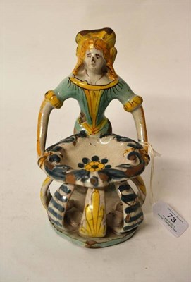 Lot 73 - A Maiolica Figural Salt, probably Caltagirone, 17th century, as a lady in long dress standing...
