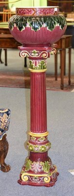 Lot 89 - A Majolica Style Jardinière and Stand, late 19th/early 20th century, of fluted ovoid form with...